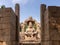 Narasimha statue from distance at Lakshmi Narasimha temple, Hampi, Karnataka, India