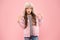 Narcissist fashionista. Child long hair soft fur hat enjoy softness. Winter fashion concept. Warm hat for cold weather