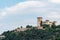 Narni, Umbria, Italy - The medieval castle of the ancient village of Narni. The blue sky in summer. The stone walls and towers of