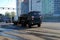 On Narodnogo Opolcheniya Street the military all-wheel drive KamAZ-65225 truck tractor with the trailer a trawl goes.