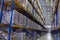 Narrow aisle warehouse with pallet storage system.