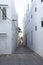 Narrow alley in Assila, Morocco