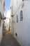 Narrow alley in Assila, Morocco