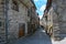 Narrow alley  with houses from field stones in Virgoletta, a beautiful ancient mountain village, district of Villafranca in