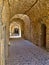 Narrow alley at the medieval castle village of Mesta in Chios island , Greece