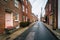 Narrow alley and row houses in Fells Point, Baltimore, Maryland