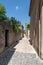 Narrow alley small street in Menerbes village in Luberon France