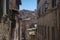 Narrow alley in tuscan village. antique italian lane, Tuscany, Italy