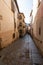 Narrow alley way in the heart of the historic city center of Toledo