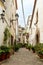 The narrow alleys of Tossa de Mar, Spain, lead to hidden courtyards and picturesque squares