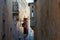 Narrow back street in Mdina Malta with wooden balconies