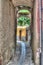 Narrow backstreet in Bosa, Italy