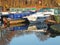 Narrow boats converted to houseboats moored in the marina at brighouse basin in west yorkshire