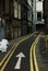 Narrow city street. Arrow sign one way. Manchester, England, Eur