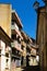 Narrow cobbled street between townhouses in Mirandela, Portugal