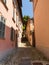 Narrow and cobbled street of the village of Orta San Giulio italy on a summer evening