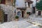 Narrow cobbled streets with flowers in the old village Gourdon,