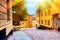 The narrow cobblestone street Bastugatan in Sodermalm with medieval houses in Stockholm at summer sunny day