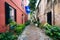 Narrow cobblestone street and old buildings in Charleston, South Carolina