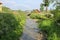 Narrow creek in small town of Carpathians