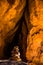 Narrow dark slot canyon through the Joint Trail in Canyonlands National Park