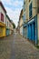 Narrow empty alley in the old town of Amiens