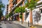 Narrow green street in Barcelona city