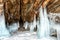 Narrow grotto and splash of ice on rock