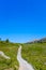 Narrow hiking trail in alpine nature