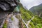 The narrow hiking trail clings to the edge of the cliff, offering a thrilling adventure. The famous hiking trails in the Taroko