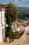 Narrow hilly street in the idyllic whitewashed Andalusian village of Jimena de la Frontera