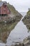 Narrow inlet with seagulls on stilt house,  A,  Lofoten, Norway