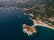 Narrow isthmus with private beaches leads to the island of Sveti Stefan. Top view