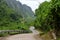 Narrow jungle road Karst mountains, Phomg Nha, Vietnam