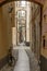 Narrow lane in historical village, Finalborgo, Italy