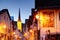 Narrow main street in blue hour with painted houses in Bavaria