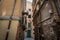 Narrow medieval street of stari grad, the old town of Rijeka, with medieval buildings about to collapse, decaying, in a dark spot