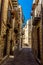 Narrow medieval streets with overhead balconies in Petralia Soprana in the Madonie Mountains, Sicily