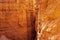 Narrow Navajo hiking trail through massive cliffs of hoodoo sandstone rock formation in Bryce Canyon National Park, Utah, USA