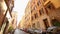 Narrow old street in rome. Ancient street in rome. Cars parked along a narrow street in Rome