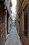Narrow old street in Venice Italy