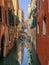 A narrow old truly typical venetian canal