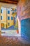The narrow passage and colored houses of Oria, Valsolda, Italy