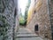 Narrow road, cloisters and culverts inside the castle in Nice, France