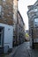 Narrow road with cobblestone pavement and historic buildings in Stolberg, Eifel