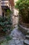 Narrow road inside the beautifully preserved medieval village Carmine Superiore. Cannobio. Northern Italy