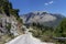 A narrow, rural road in the mountains