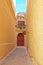 Narrow silent street with lamp Mdina Malta