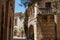 Narrow Spanish street in a hot day