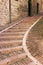 Narrow staircase street of the old town of Assisi, Italy